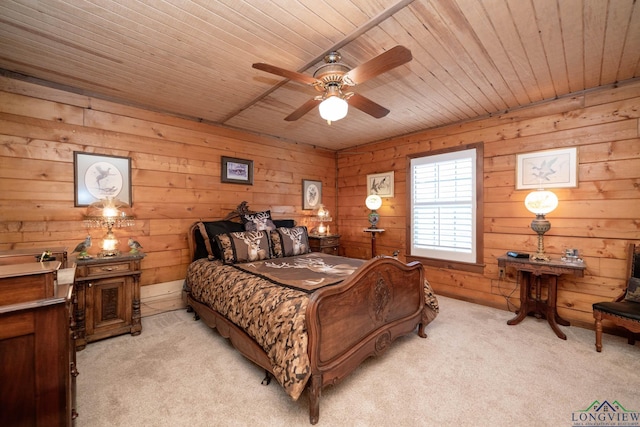 bedroom with wooden walls, ceiling fan, wooden ceiling, and light carpet