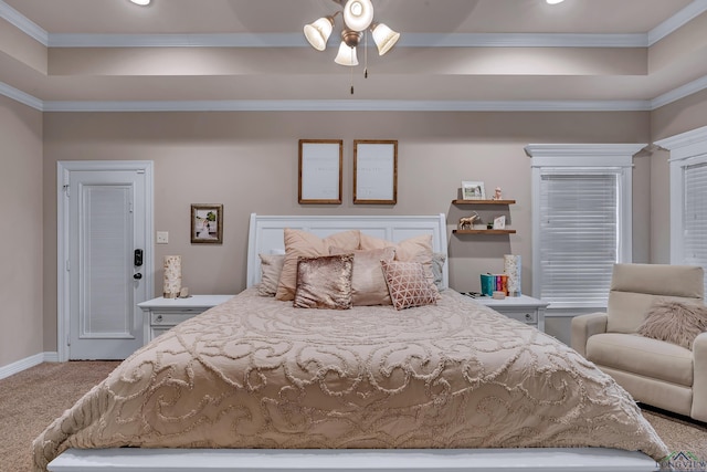 bedroom with crown molding, carpet, and ceiling fan