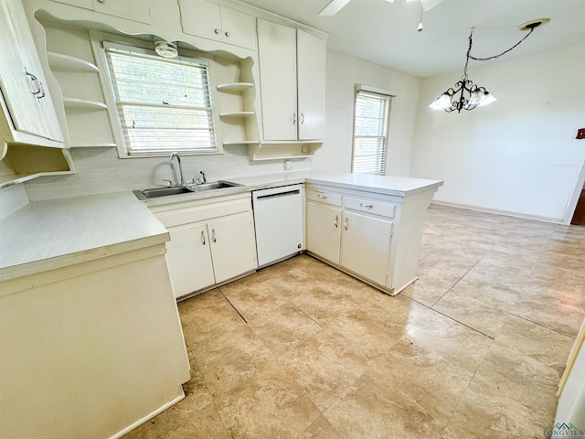 kitchen with kitchen peninsula, dishwasher, white cabinets, and pendant lighting