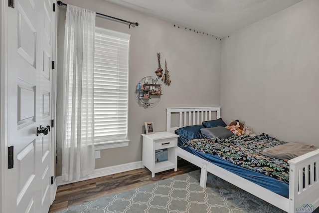 bedroom featuring hardwood / wood-style flooring