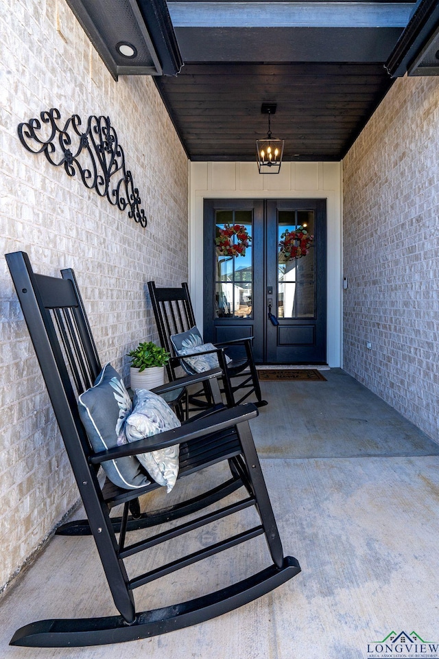 entrance to property featuring french doors