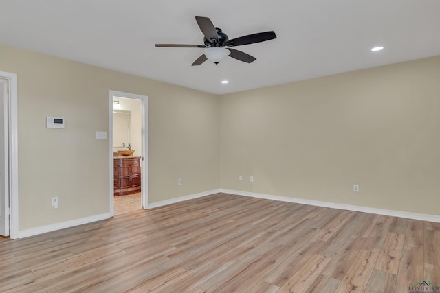 unfurnished room with recessed lighting, a ceiling fan, baseboards, and light wood-style floors
