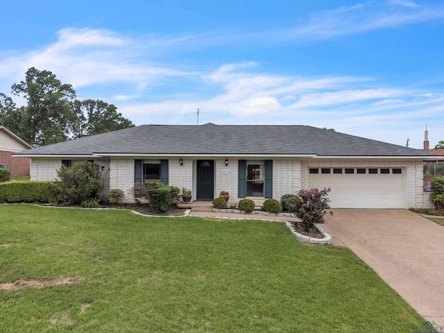 single story home featuring brick siding, an attached garage, and a front lawn