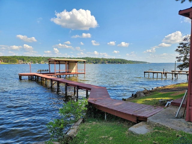 view of dock with a water view