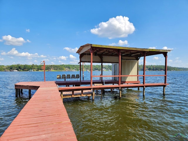 dock area featuring a water view