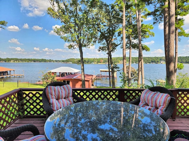 deck featuring a water view