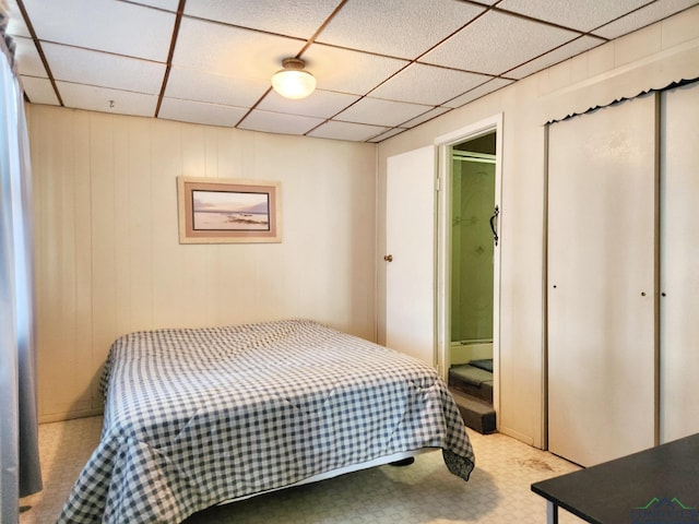 bedroom featuring a paneled ceiling