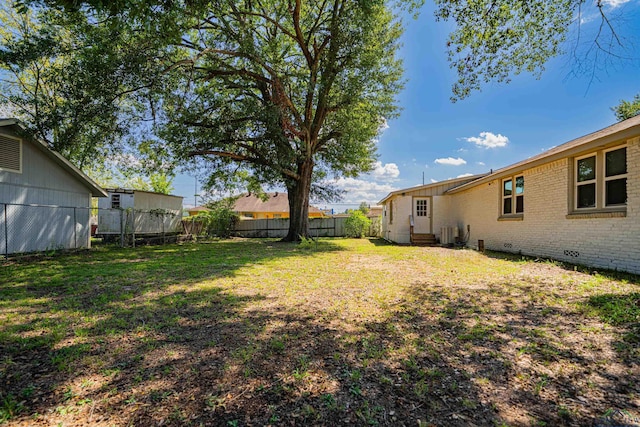 view of yard featuring central AC