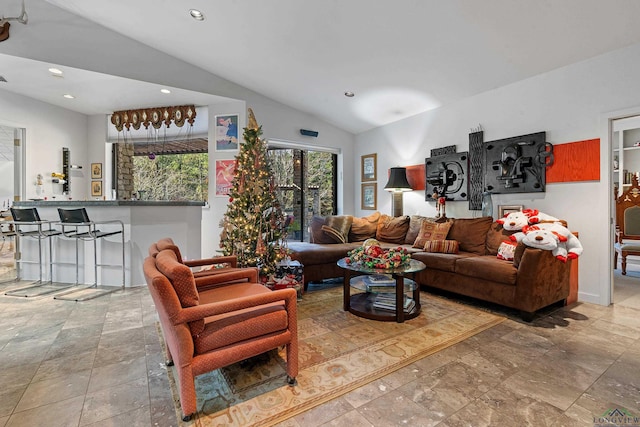 living room with lofted ceiling