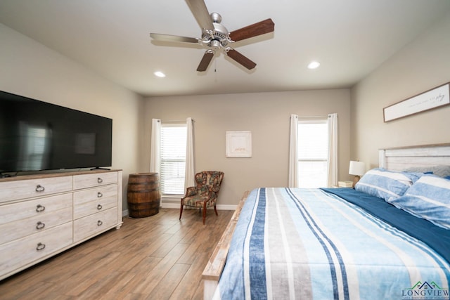 bedroom featuring recessed lighting, ceiling fan, baseboards, and wood finished floors