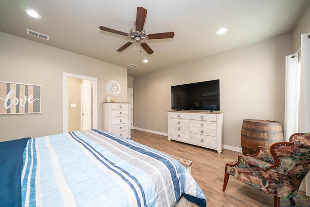 bedroom featuring ceiling fan, recessed lighting, wood finished floors, visible vents, and baseboards