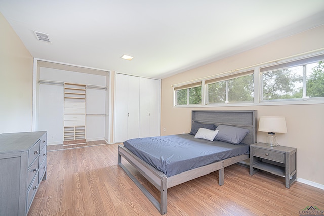 bedroom with light hardwood / wood-style flooring