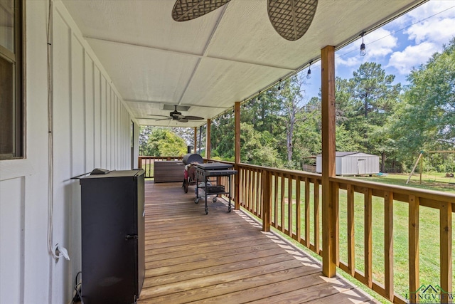 223 Circle Ridge Dr, Gilmer, TX 75645 - wooden terrace featuring a ceiling fan and a yard