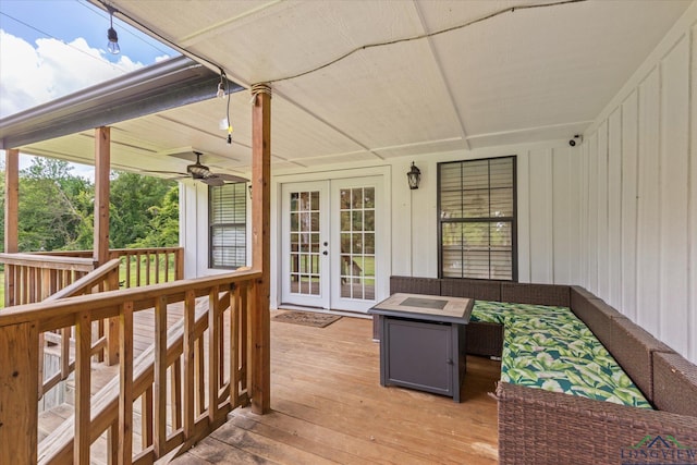 223 Circle Ridge Dr, Gilmer, TX 75645 - wooden deck with french doors and ceiling fan