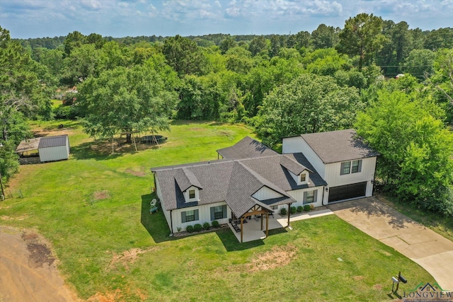 223 Circle Ridge Dr, Gilmer, TX 75645 - aerial view of property and surrounding area with a forest