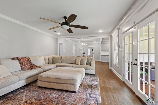 223 Circle Ridge Dr, Gilmer, TX 75645 - living room with french doors, crown molding, a chandelier, wood finished floors, and healthy amount of natural light
