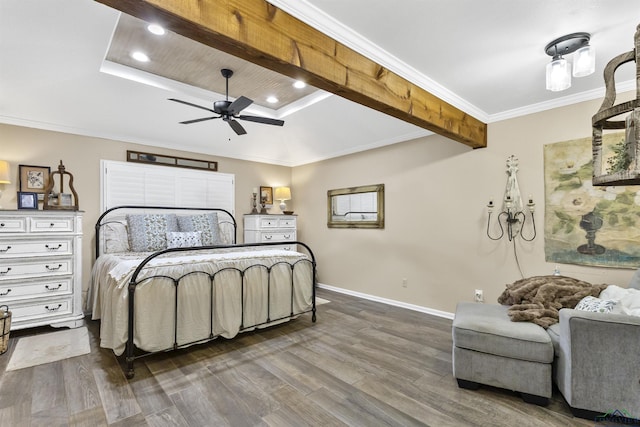 bedroom with baseboards, recessed lighting, wood finished floors, and crown molding