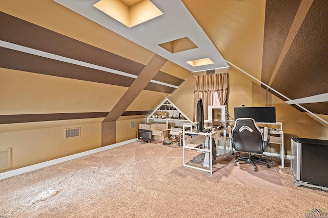 office with lofted ceiling, baseboards, visible vents, and carpet flooring