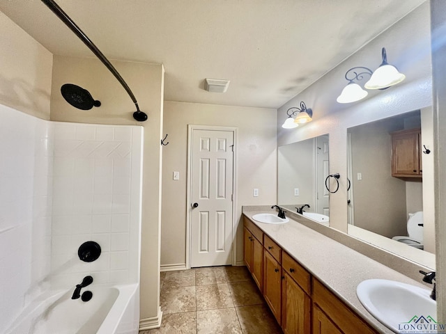 bathroom with shower / tub combination and vanity