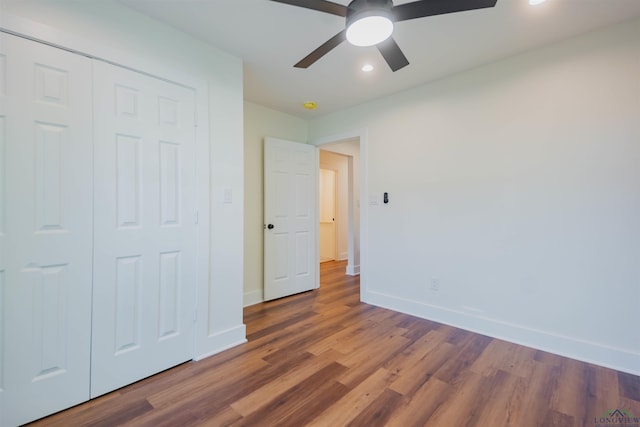 109 Montie St, Longview, TX 75604 - unfurnished bedroom featuring wood finished floors, baseboards, recessed lighting, ceiling fan, and a closet