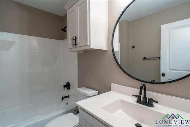 full bathroom with toilet, vanity, and bathtub / shower combination