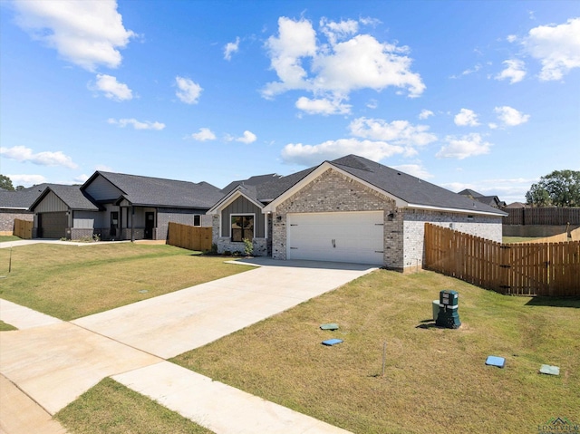 view of front facade with a front lawn and a garage