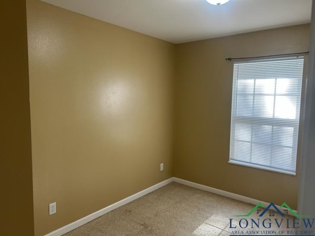 42 Wingwood Ter, Marshall, TX 75670 - unfurnished room with light carpet and baseboards
