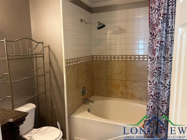 42 Wingwood Ter, Marshall, TX 75670 - full bathroom featuring shower / bath combination with curtain, crown molding, and vanity