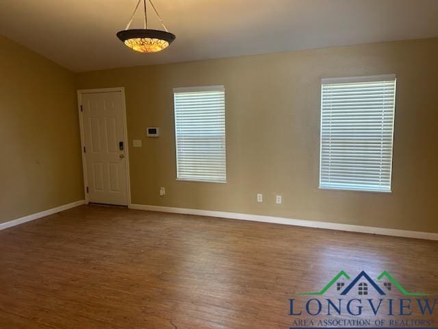 42 Wingwood Ter, Marshall, TX 75670 - unfurnished room with wood finished floors and baseboards