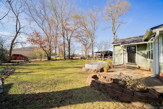 view of yard featuring a patio area