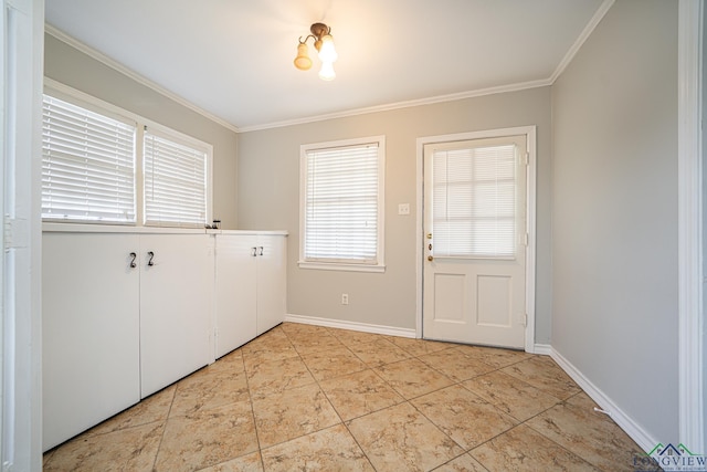 entryway with light tile patterned floors, ornamental molding, and a notable chandelier