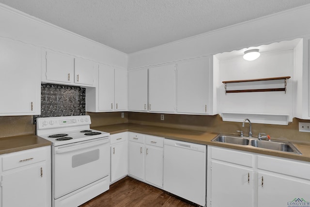 kitchen featuring a textured ceiling, white appliances, white cabinetry, and sink