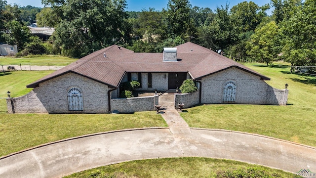 view of front of home with a front yard