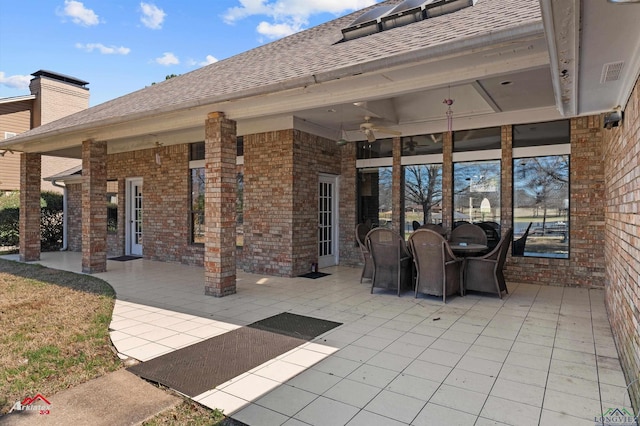 view of patio / terrace featuring outdoor dining space, visible vents, and a ceiling fan