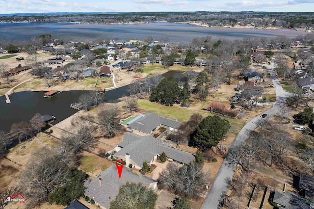 aerial view with a water view and a residential view