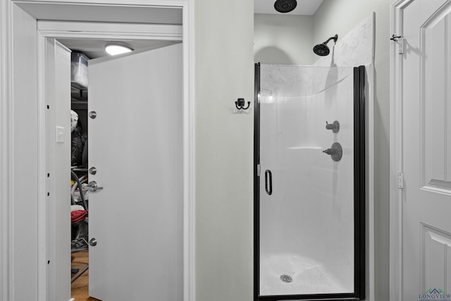 full bathroom featuring a stall shower