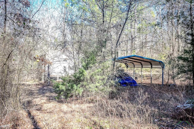 view of yard with a carport