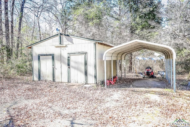 view of outbuilding with a carport