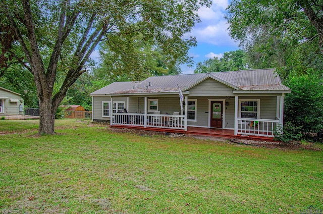 single story home with covered porch and a front lawn