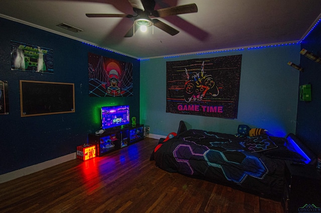 bedroom with hardwood / wood-style flooring and ceiling fan