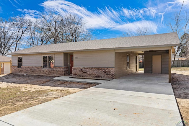 ranch-style house with a carport