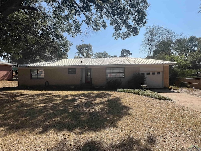 single story home with a garage