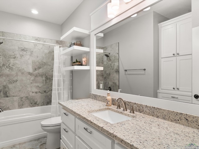 full bathroom featuring toilet, shower / tub combo, and vanity