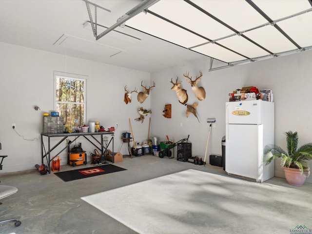 garage featuring white refrigerator