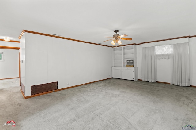 216 Hickory St, Gladewater, TX 75647 - unfurnished living room with a ceiling fan, carpet floors, ornamental molding, and baseboards