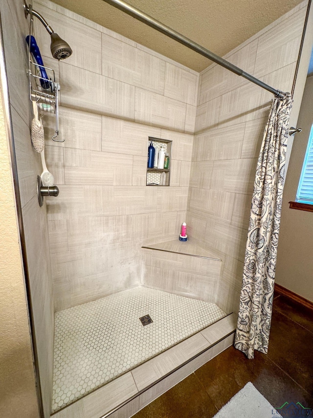 bathroom with curtained shower