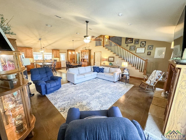 living room featuring vaulted ceiling and ceiling fan