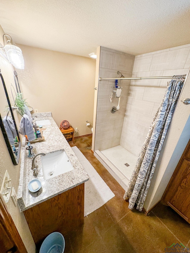 bathroom with a shower with shower curtain, vanity, toilet, and a textured ceiling