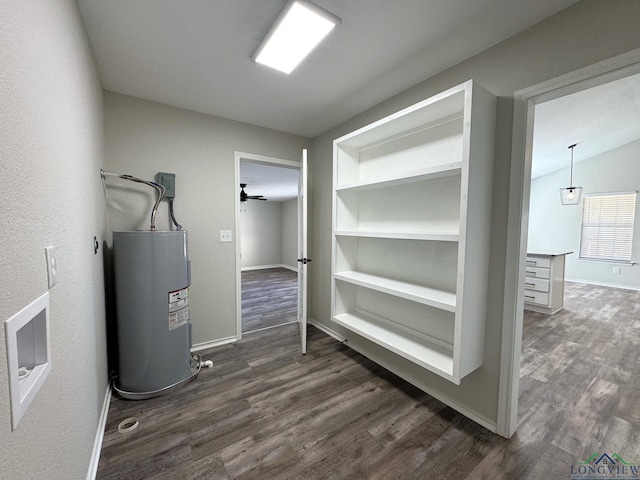 utility room featuring water heater