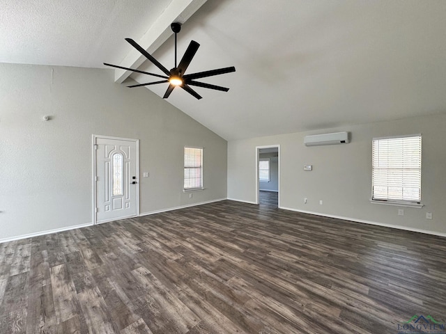 unfurnished living room with ceiling fan, an AC wall unit, dark hardwood / wood-style floors, and beam ceiling